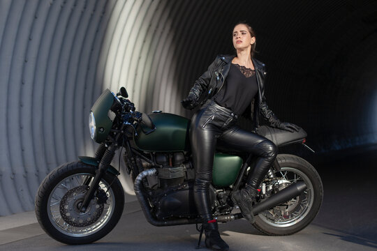 girl in black with a motorcycle