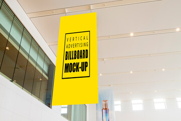 Mock up vertical signboard hanging from ceiling over on walkway