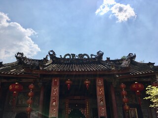 Fototapeta premium Architecture Chinese style of Dragon Kammalawat temple in Bangkok, Thailand (Silhouette scene blue sky and sunlight)