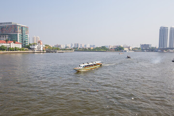 Naklejka premium Boat for tourist crossing the river in Bangkok, Thailand