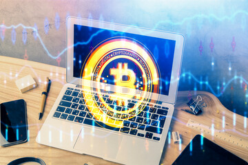 Double exposure of blockchain theme hologram and table with computer background. Concept of bitcoin...