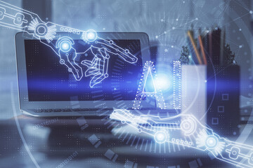 Double exposure of laptop computer and technology theme hologram. Concept of freelance work.