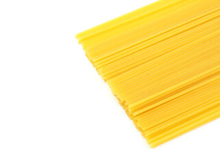 Uncooked of long spaghetti isolated on a white background. Concept of food background..