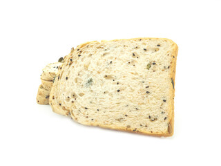 Fresh homemade slice of whole wheat bread isolated on a white background...