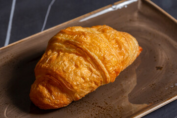Croissant served on a plate
