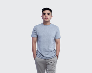 Fototapeta premium Young handsome man was posing wearing heather grey t-shirt short sleeve with mockup concept