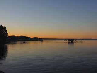 Sunset, summer, beautiful sky. Pier on the big Kama river. Ural, Russia, Perm Territory, Elovo.