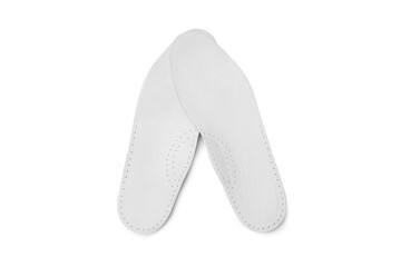 Isolated orthopedic insole on a white background. Treatment and prevention of flat feet and foot diseases. Foot care, comfort for the feet. Wear comfortable shoes. Medical insoles.