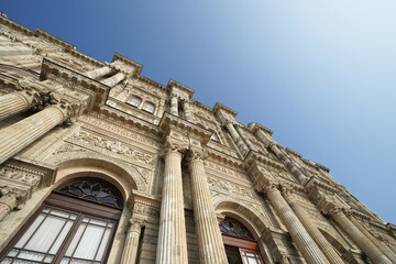 Exterior Neoclassical architecture and royal facade building design of 'Dolmabahce imperial palace' located along the European shore of the Bosphorus Strait- Besiktas, Turkey