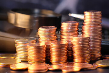 close up of coins on black background, coins stacked background and advertising coins of finance and banking concept