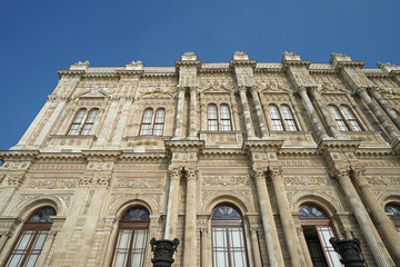 Exterior Neoclassical architecture and royal facade building design of 'Dolmabahce imperial palace' located along the European shore of the Bosphorus Strait- Besiktas, Turkey