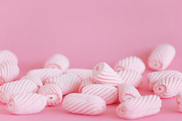 Fototapeta na wymiar Pink marshmallow candy background