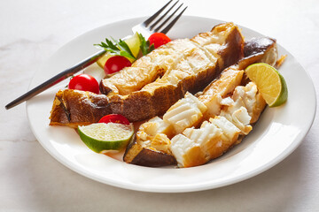 Smoked halibut steaks on a marble background © myviewpoint