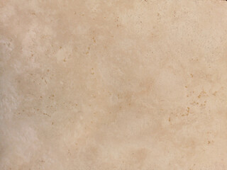 Beige low contrast smooth decorative stone concrete textured background. Abstract soft neutral antique artistic backdrop texture to your concept or product
