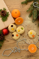 Obraz na płótnie Canvas Homemade Christmas cookies on a wooden background.