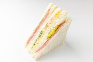 Ham cheese sandwich on white background
