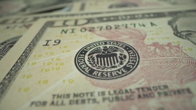 United states federal reserve system seal with watermark and notes. American president on 10 dollars bill. Macro shot. Panorama. Many USA dollars on the table. Powerful value