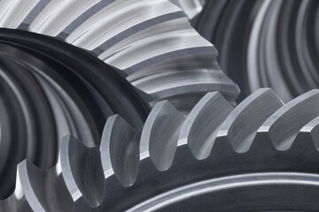 Close-up of three cog wheels in grey color