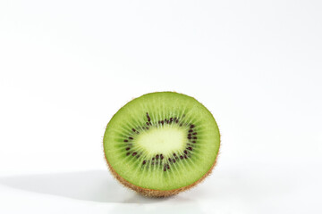 Fototapeta na wymiar Half fresh ripe kiwi isolated on white background