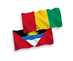 Flags of Guinea and Antigua and Barbuda on a white background