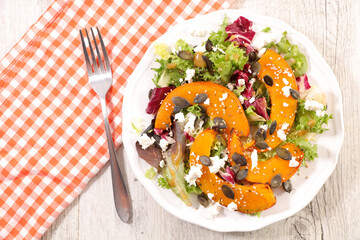 grilled pumpkin slice salad with lettuce and cheese