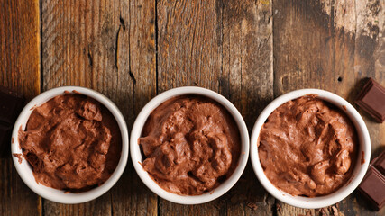 chocolate mousse- vegan chocolate dessert on wood background