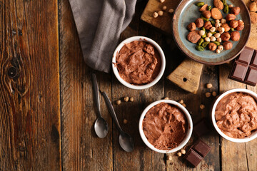 chocolate mousse- vegan chocolate dessert on wood background