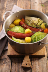 sausage, vegetable and broth on board