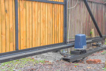 a automatic gate mechanism on the garden plot