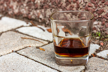 whiskey glass on a street