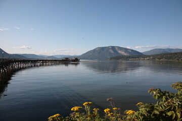 View of Shuswap lake with wooden wharf at Salmon Arm, British Columbia, Canada