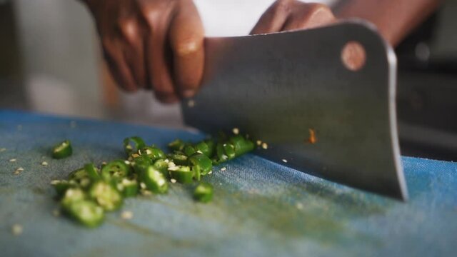 chf cutting vegetables for cooking