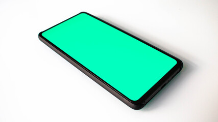 Obraz na płótnie Canvas Smartphone with an aqua screen on white