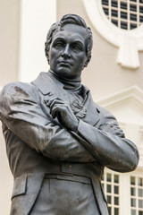 The Stamford Raffles statue in front of the Victoria Memorial Hall and Theatre, sculpted by Thomas Woolner, is a popular icon of Singapore. 
The statue survived World War II unscathed 