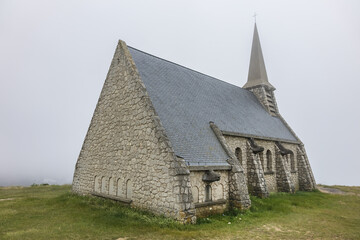 Chapel Notre Dame de la Garde in Etretat. August 6, 1856 chapel was blessed, chapel dedicated to Blessed Virgin. Etretat is a commune in Seine-Maritime department in Haute-Normandie region in France.