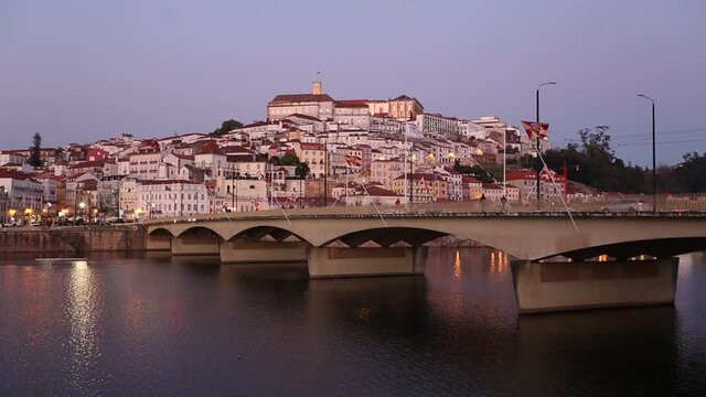 University of Coimbra as seen from across the Mondego river and the bridge