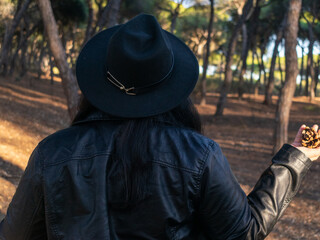 Woman posing in disguise for Halloween in a forest