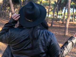 Woman posing in disguise for Halloween in a forest