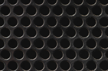 Speaker grill texture is black with dust particles