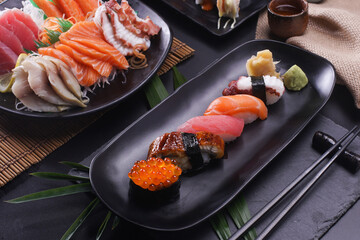 Sashimi and sushi Japanese food set. Salmon, Ikura, wasabi, fish, shrimp and tuna.