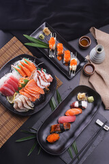 Sashimi and sushi Japanese food set. Salmon, Ikura, wasabi, fish, shrimp and tuna.