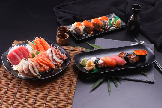 Sashimi and sushi Japanese food set. Salmon, Ikura, wasabi, fish, shrimp and tuna.