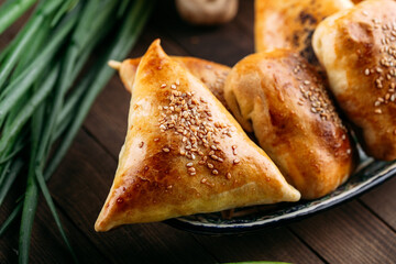 Oriental dish baked pie with meat triangle samsa