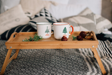 white cups with christmas decor