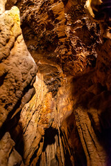 Illuminated picturesque karst rock formations in Balcarka Cave, Moravian Karst, Czech: Moravsky Kras, Czech Republic
