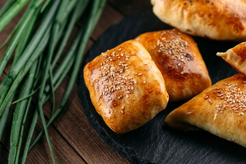 Different oriental baked pie with meat samsa