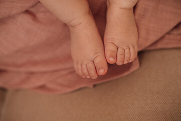 Baby feet close-up. Maternity, breastfeeding, preparation and expectation motherhood concept.