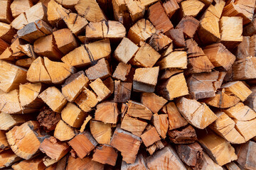 Firewood. Stacked Logs. Preparation of firewood for the winter.