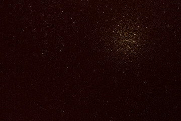 Dark brown texture with glitter and spot of light (Macro Focus on Texture)