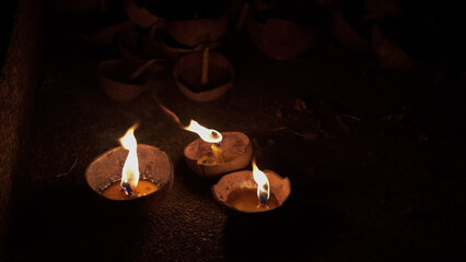 Blur candles in the dark background.